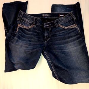 Silver Jeans Co. super stretch Suki Mid Slim Boot jeans 33x33